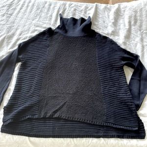 Planet turtleneck sweater